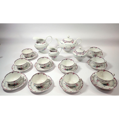 90 - A Limoges L Barnardaud & Co tea service comprising ten cups and saucers, teapot, two jugs and sugar