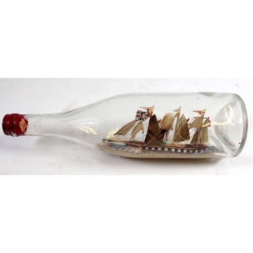 904 - A Victorian model steam ship in a glass bottle, 28cm wide