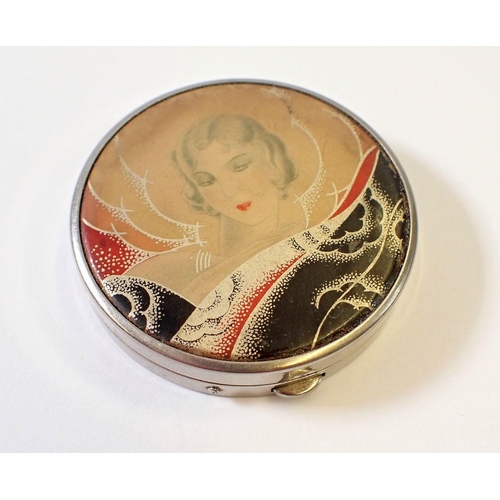 924 - An Art Deco compact with ladies face and stylised wave decoration, by Atkinson's 5cm diameter