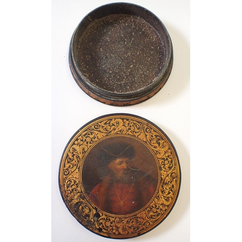 925 - A 19th century paper mache snuff box with continental portrait of a gentleman