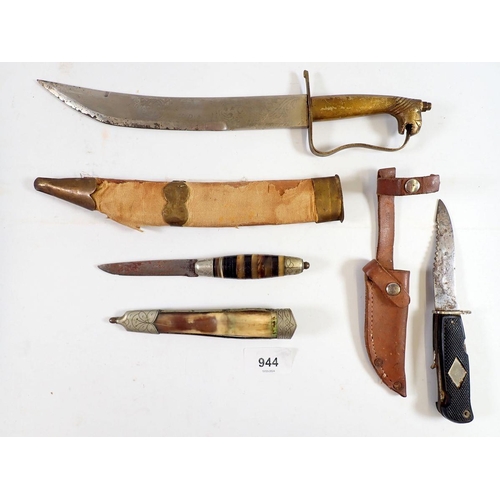 944 - A Solingen small serrated knife, an Egyptian decorative knife and a horn handled knife