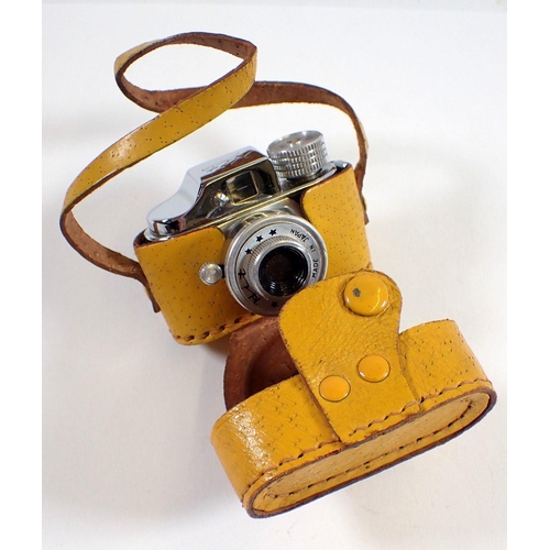 964 - A Japanese miniature Hit camera in yellow case