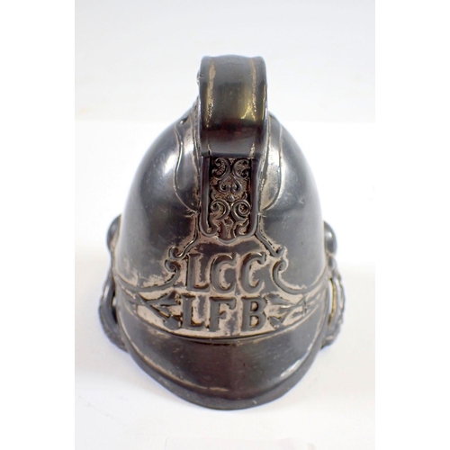 965 - A novelty inkwell in form of a London fireman's helmet, LCC LBF, 10cm