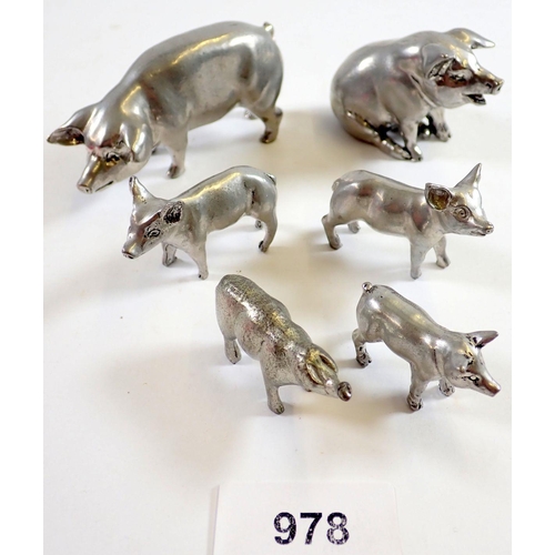 978 - Six metal model miniature pigs, largest 8.5cm