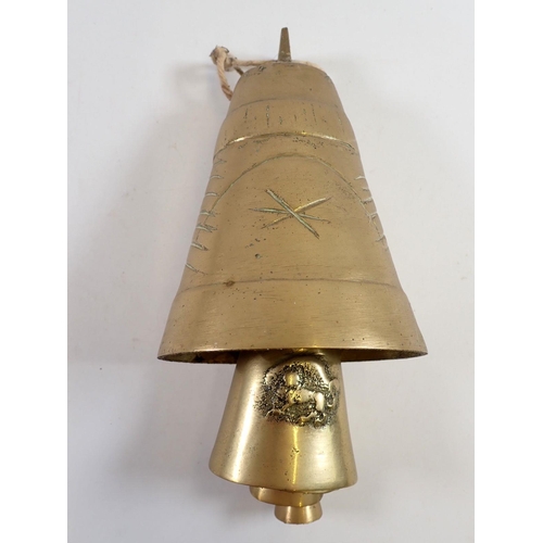 981 - A graduated set of brass camel bells