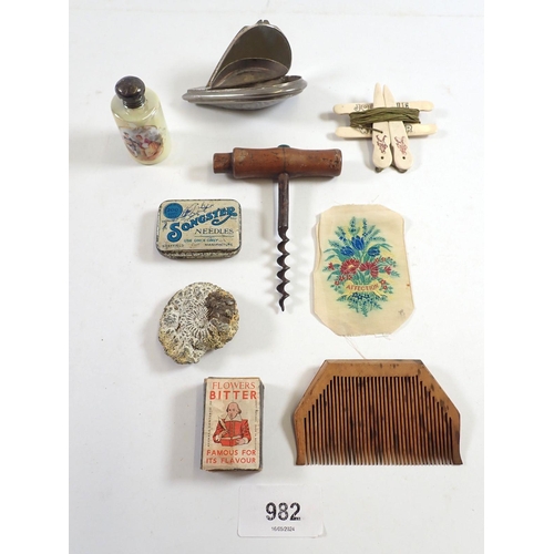 982 - A box of small collectables including snuff box, scent bottle, corkscrew etc.