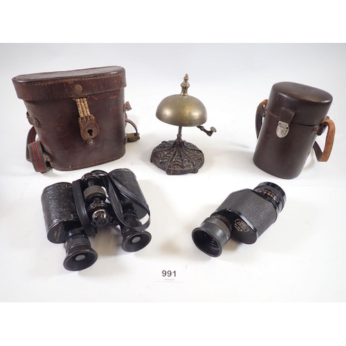 991 - A brass table bell, pair of Lumex binoculars and a Carl Zeiss 8 x 30 monocular