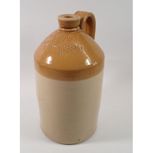 1110 - A stoneware flagon for E A Stephens family Grocer, Newent