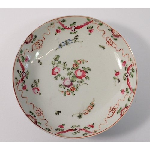 224 - An 18th century saucer painted swags of flowers, 14cm diameter