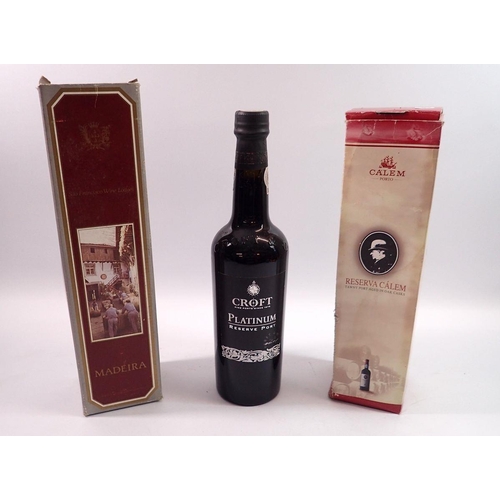 1022 - A boxed bottle of Blandy's Madeira, a Calem Porto, boxed and a Croft platinum port