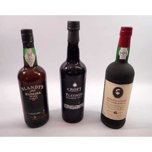 1022 - A boxed bottle of Blandy's Madeira, a Calem Porto, boxed and a Croft platinum port