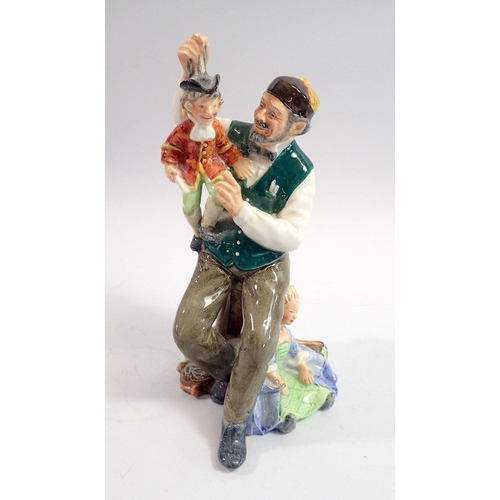 103 - A Royal Doulton figure The Puppet Maker No.2253, 21cm tall