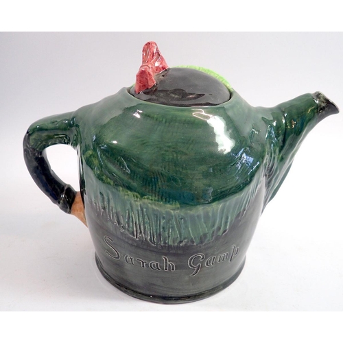 106 - A Doulton large Sairey Gamp teapot, 18cm tall
