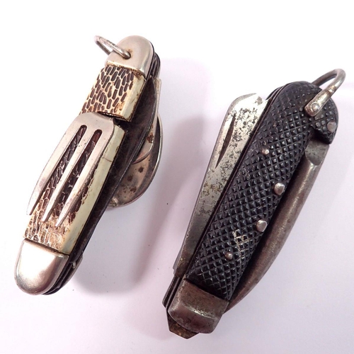 1068 - A military penknife with arrow mark and another knife with integral cutlery set