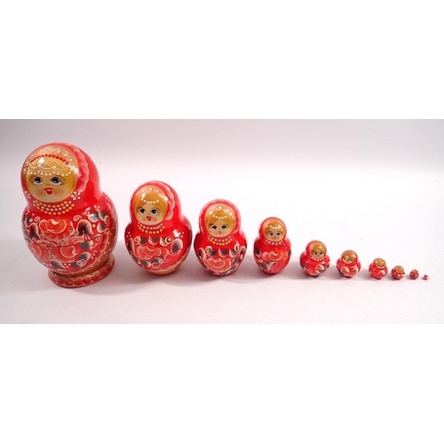 1082 - A vintage Russian doll comprising ten dolls, 14cm tall