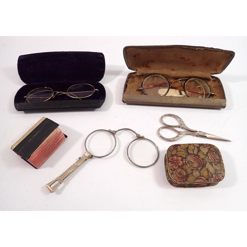 1097 - A pair of horn rimmed spectacles, miniature dictionary etc.