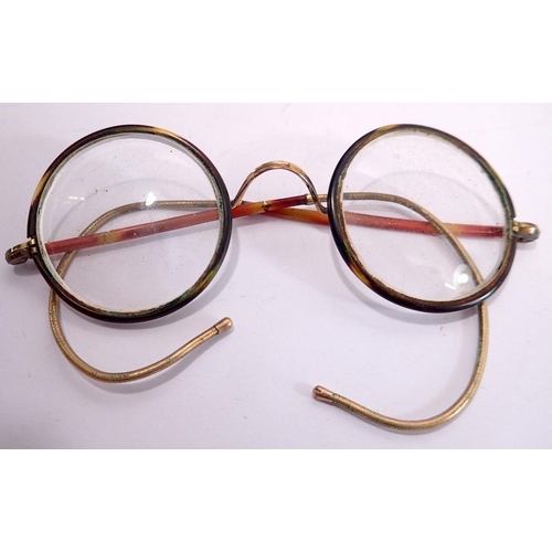 1097 - A pair of horn rimmed spectacles, miniature dictionary etc.