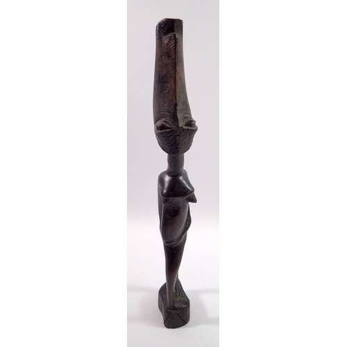 1099 - A tribal carved wood fertility figure, 40cm tall