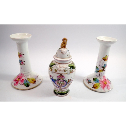 112 - A 'Nelson' vase and two Victorian floral candlesticks, 16cm tall