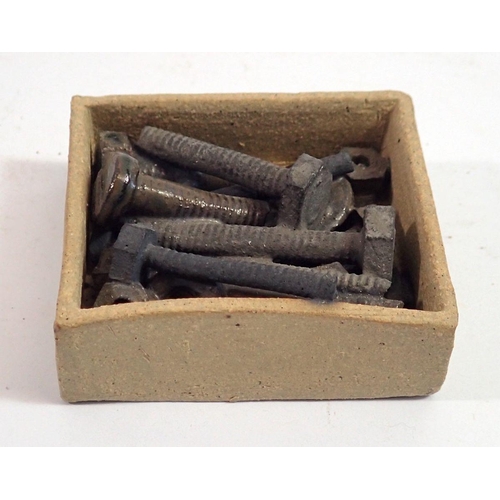 118 - A Janet Halligan trompe l'oeil stoneware group of nuts and bolts, 6 x 5.5cm