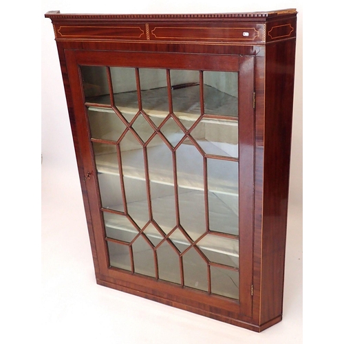 1188 - A 19th century mahogany astragal glazed corner cupboard with satinwood inlay