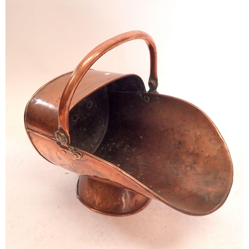 1198 - A helmet form copper coal scuttle