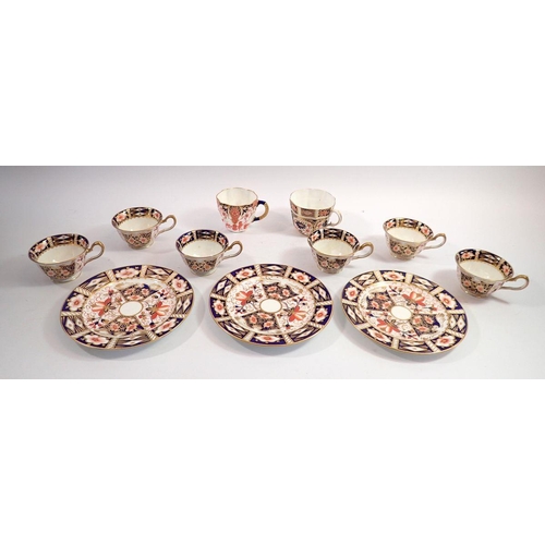 121 - A set of six Royal Crown Derby Imari small cups pattern no. 2491 and three similar tea plates plus t... 