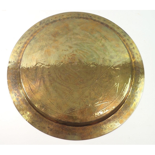 1225 - A Persian brass, copper and white metal inlaid tray, 34cm diameter