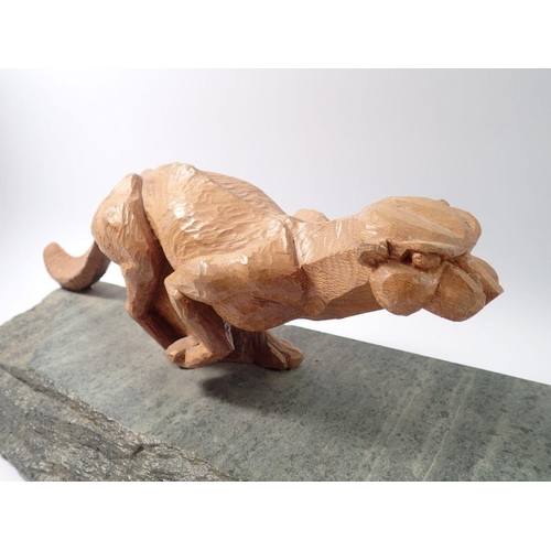 1240 - A large carved wood and stone group of a cheetah chasing an antelope by Dave Johnson (Blaisdon) 71cm... 