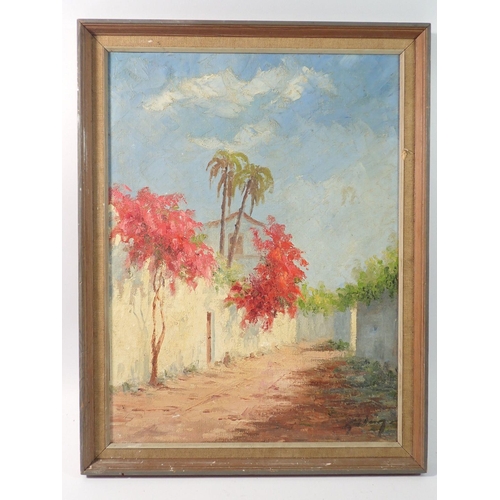 1258 - An oil on board Mediterranean scene with tree and house, signed indistinctly, 42 x 31cm