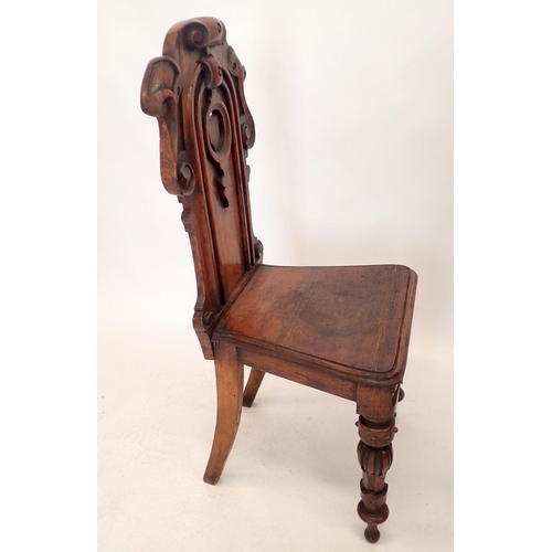 1361 - A pair of Victorian mahogany shield back hall chairs