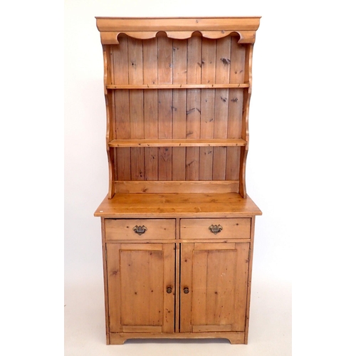 1431 - A small pine dresser with two drawers over cupboard, 91cm wide, 189cm tall