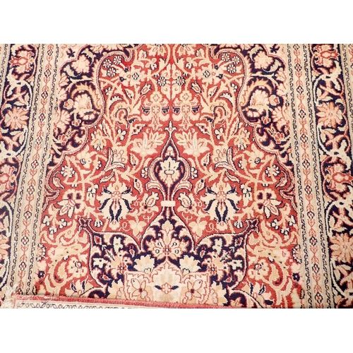 1436 - A Persian style rug with floral medallion in blue, red and cream 155x91cm