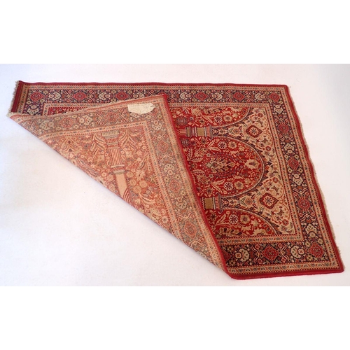 1439 - A Persian prayer rug with arch design and all over floral decoration on a red ground 161x111cm