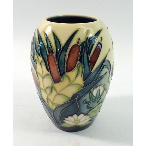 148 - A Moorcroft vase in the Lamina pattern, 13cm tall