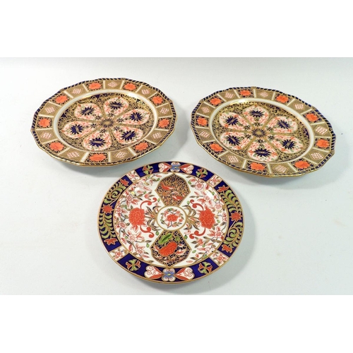 150 - A pair of Royal Crown Derby Imari plates pattern no. 1127, 22.5cm diameter plus one other