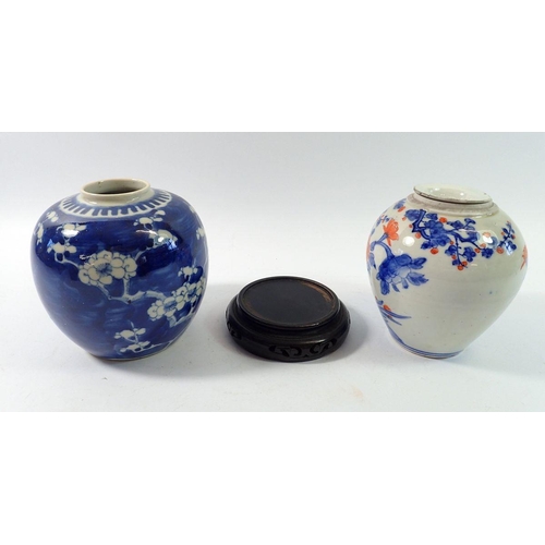 152 - A Chinese blue and white prunus blossom jar, 13cm tall - no lid and stand plus another oriental jar