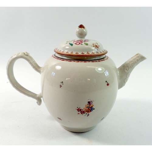 158 - A Chinese famille rose teapot painted sprigs of flowers, 17cm tall