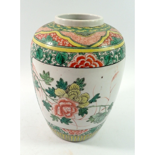 167 - A late Qing dynasty famille verte vase painted floral reserves, 22cm
