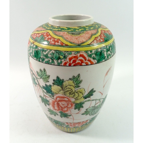 167 - A late Qing dynasty famille verte vase painted floral reserves, 22cm