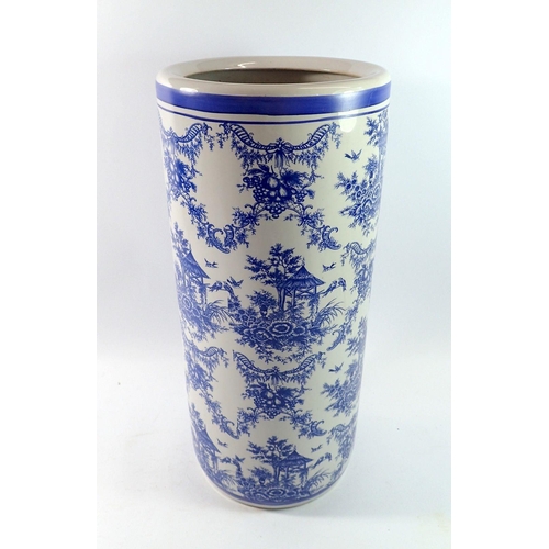 180 - A blue and white umbrella stand, 46cm tall