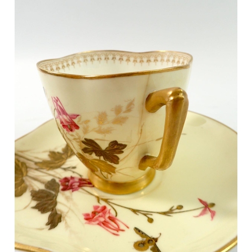 200 - A Royal Worcester cup and saucer painted flowers and butterfly (hairline to cup) and a miniature ivo... 