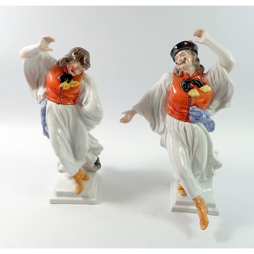 210 - Two Herend porcelain figures of dancing men numbered 5496 and 5490, 30cm tall