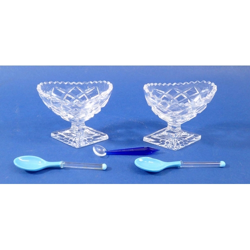 239 - A pair of cut glass salts and a pair of turquoise glass spoons and a blue one