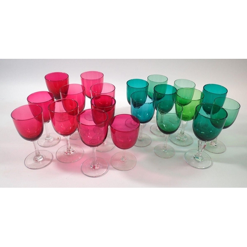 242 - Twenty various antique cranberry and green glass drinking glasses