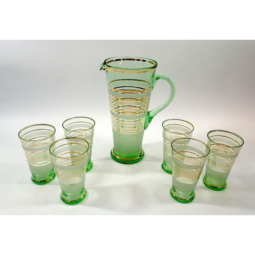 243 - A 1930's green glass lemondade set