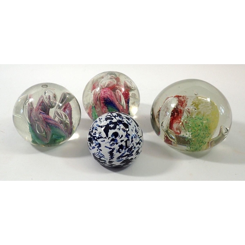 245 - Three large Victorian glass paperweights and a later Guernsey one, largest 10cm tall