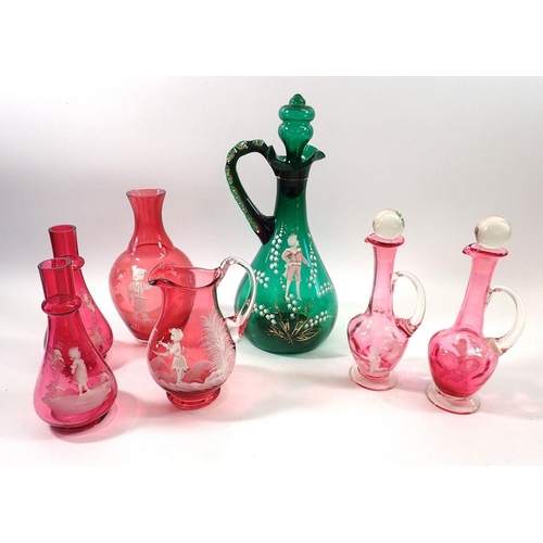 248 - A collection of Mary Gregory glass including two 19th century small ewers and a green large decanter