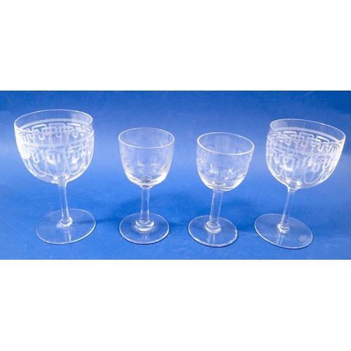 258 - A group of sherry and port glasses with engraved decoration (22)