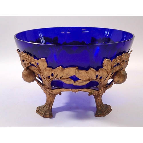 259 - A gilt metal bowl moulded fruit with blue glass liner, 24cm diameter